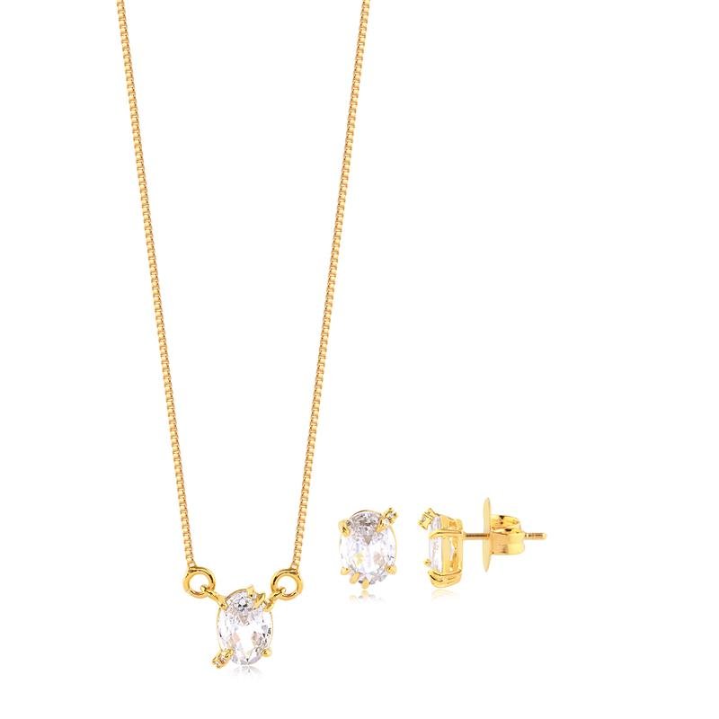 CONJUNTO OVAL COM PEDRA CRISTAL FOLHEADO A OURO